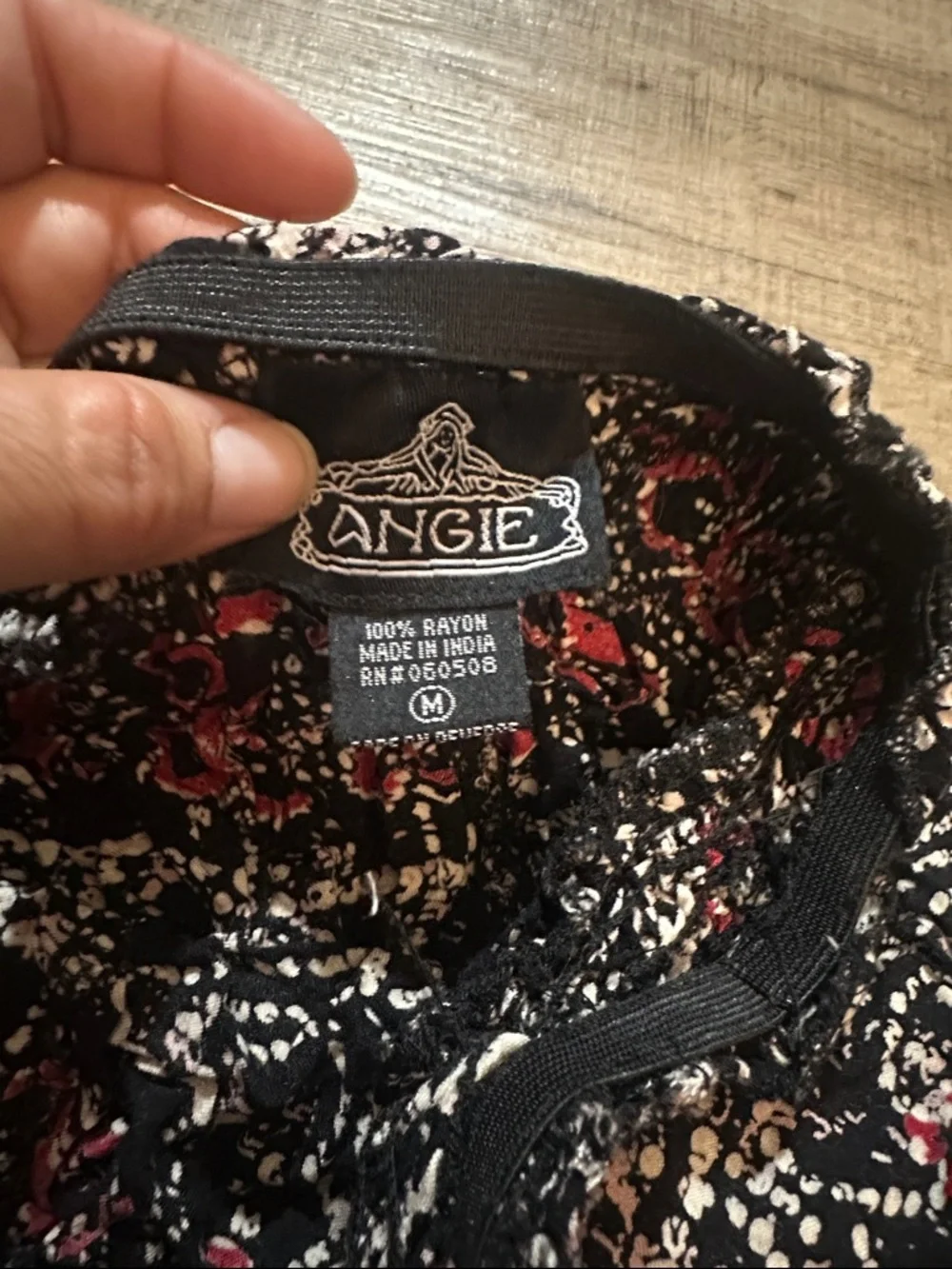 Angie Black Floral Print Top with Cream and Red Accents - Picture 2 of 7